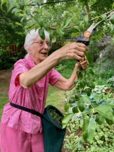 Margaret Bennet-Alder working in her garden at age 94